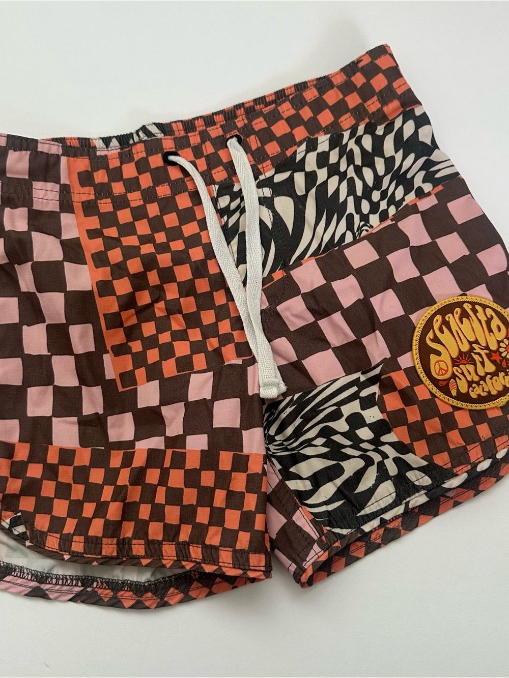 Kids Checkerboard Patch Swim Trunks in Pink & Orange